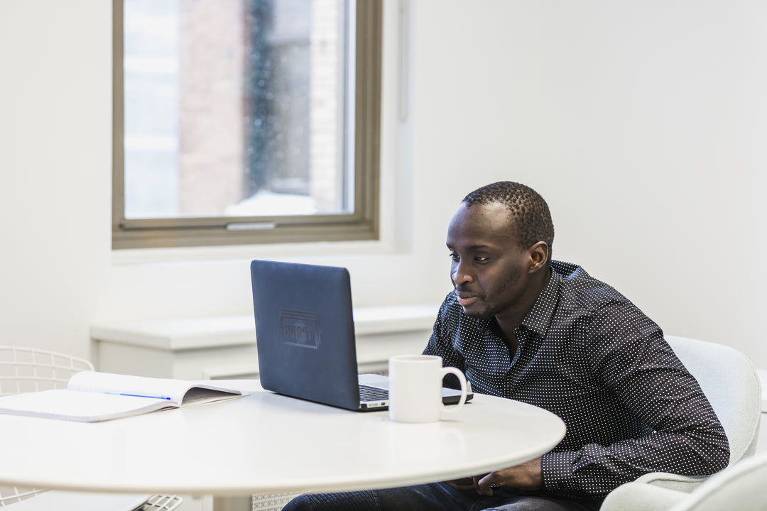 Picture Of A Small Business Owner Learning About How To Make Sales With Video Production Services